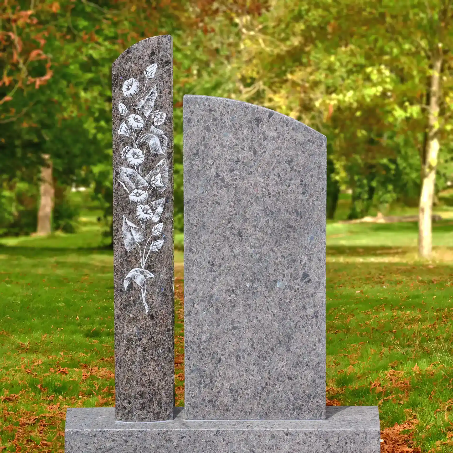 Urnengrabstein 2-teilig aus Labrador Antik Hartgestein mit kunstvoller Radierung einer Blumenranke
