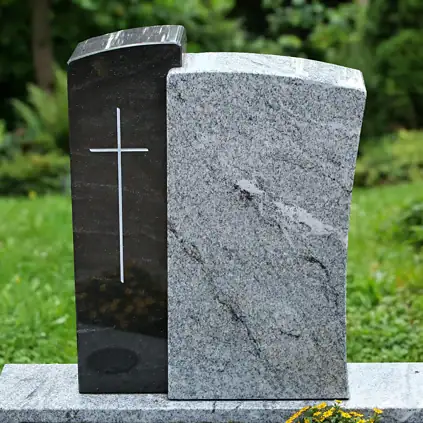 Urnengrabmal zweiteilig aus Virginia Black und Viscount White Granit, poliert.